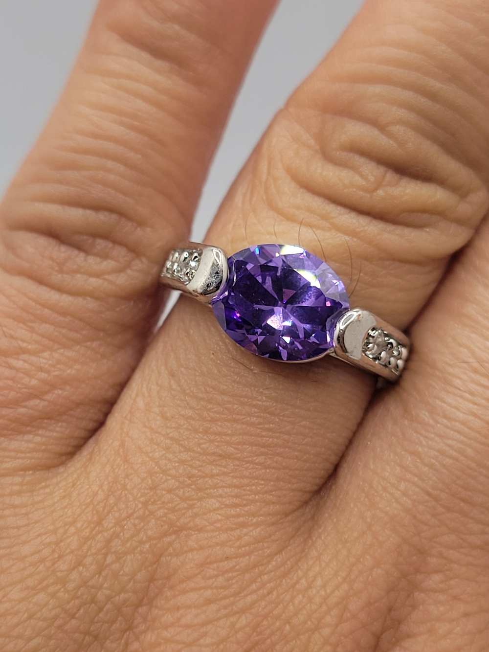 Silver-Tone Ring with Oval Purple Gemstone